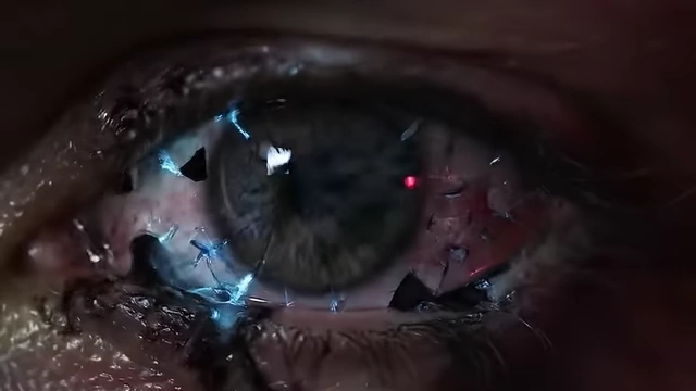 A stylized eye with shattered fragments visualizes the concept of the Aethyrs as a "terrifying projection of one man's psyche"