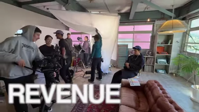 Text "REVENUE" shown over a video clip.
