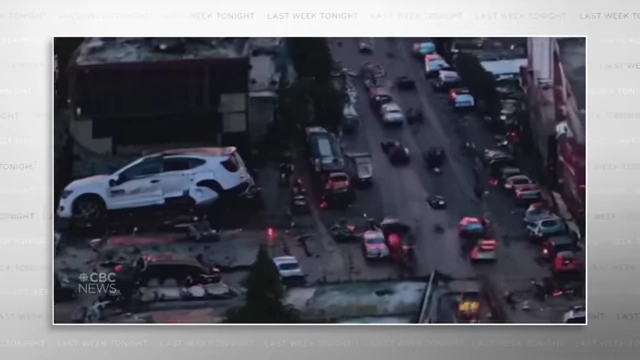 A close-up of an AI-generated explosion video, showing unrealistic elements like a disproportionately large car