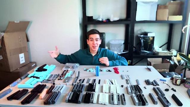 A collection of nearly 200 prototypes demonstrates the extensive iterative process for the myTMJ Pen's physical design.