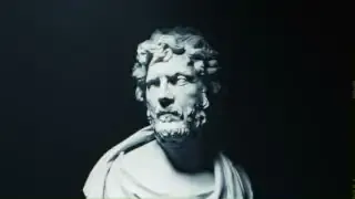 A bust of an ancient Greek philosopher, symbolizing the concepts of Kronos and Kairos.