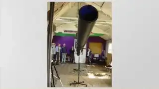 A long, tube-like infrasonic cannon, used to generate controlled low-frequency sounds for an experiment.