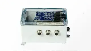 A Raspberry Shake 3D seismograph, a compact device used for measuring ground vibrations.