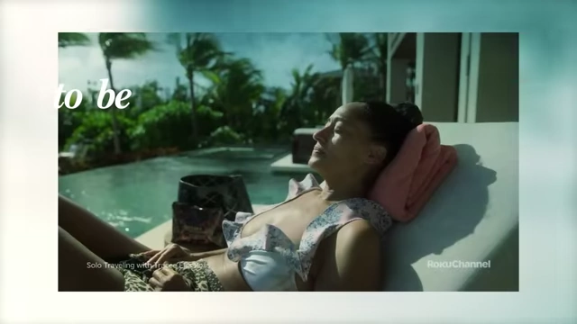Tracee Ellis Ross relaxing by a pool, enjoying a solo trip.