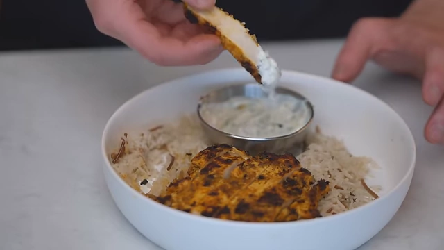 Lebanese rice served with chicken and a yogurt sauce, an example where additional acid in the rice may not be necessary.