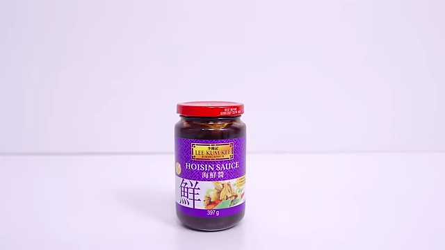 A jar of Lee Kum Kee Hoisin Sauce.