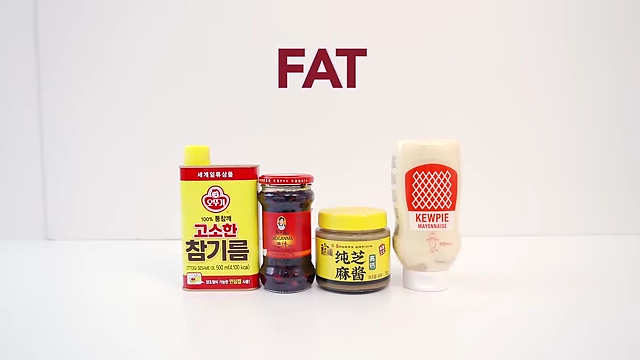 Text overlay "FAT" on a background of various fat-based condiments.