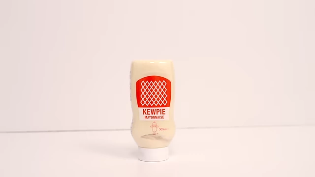 A bottle of Kewpie Mayonnaise with its iconic baby logo.