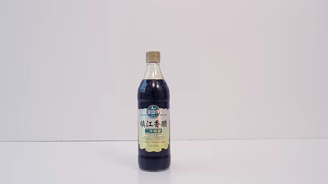 A bottle of Zhenjiang (Chinkiang) Black Vinegar.
