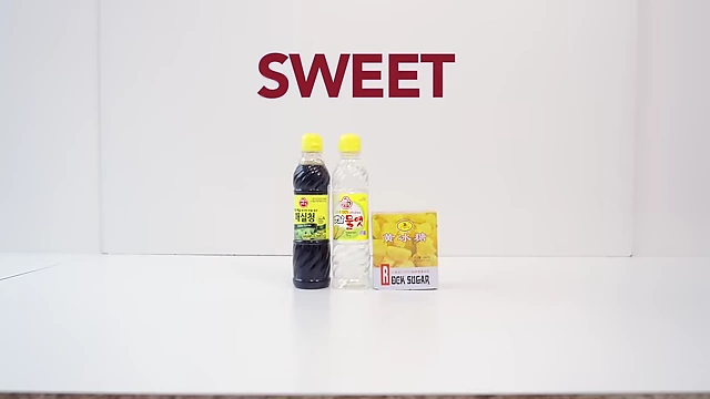 Text overlay "SWEET" on a background of various sweet condiments.