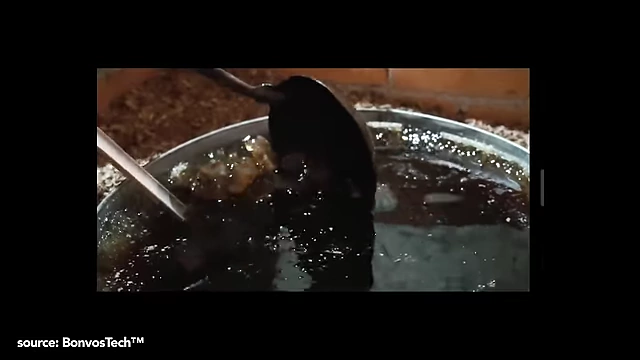Large crystals of rock sugar dissolving in a simmering liquid, illustrating its slow dissolution.