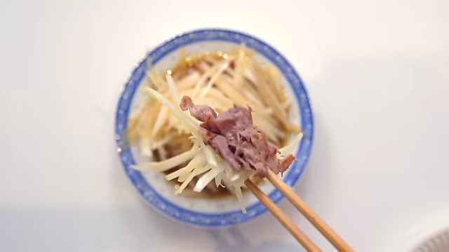 Thinly sliced beef served with onions and a spicy mustard dressing.