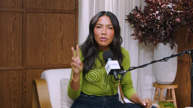 Emma Grede using hand gestures to emphasize the two most important traits for success