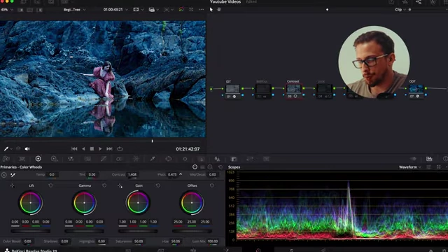 DaVinci Resolve's color wheels with Contrast set to 1.458 and Pivot to 0.475