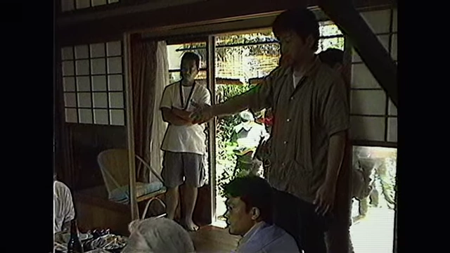 Kore-eda giving direction during the shooting of his documentary "Lessons from a Calf".