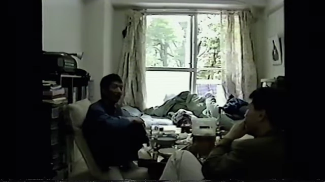Kore-eda on the set of his early documentaries, showcasing his observational style.
