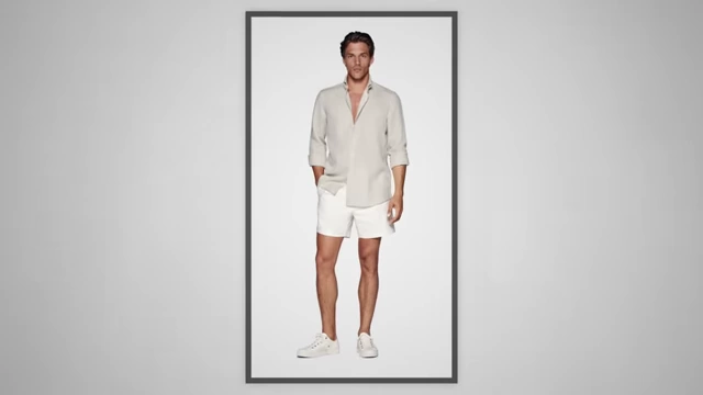 A model wearing a long-sleeve linen shirt with shorts for a comfortable and classy look.