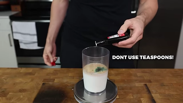 Measuring peppermint extract in drops to avoid an overpowering flavor.
