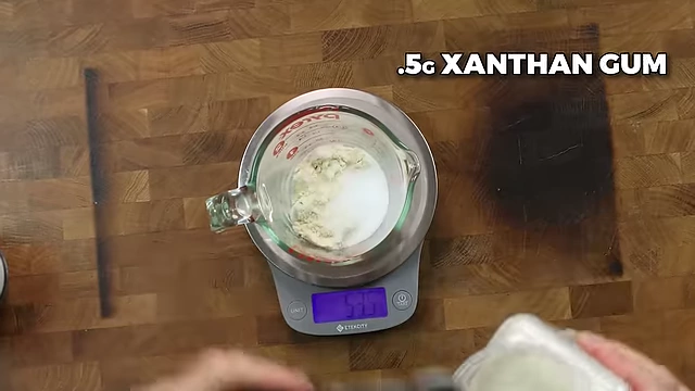 Adding 0.5g of xanthan gum to the Oreo ice cream base.
