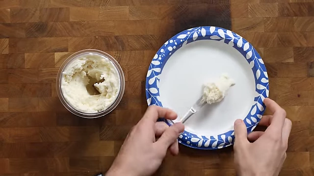 Creating a hole in the center of the processed ice cream for mix-ins.