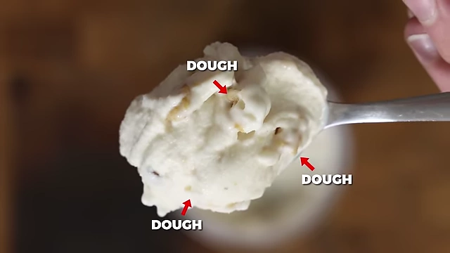 Clear view of dense cookie dough chunks in the ice cream.