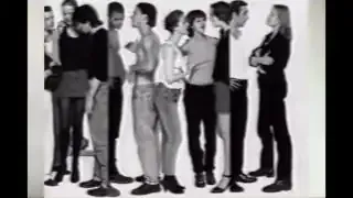 A Calvin Klein CK1 advertisement featuring a diverse group of models, embodying the sterile and clean aesthetic of the 1990s.