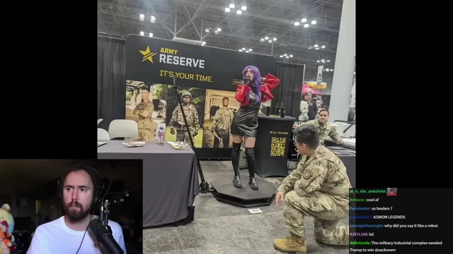 Army reservists recruiting at an anime convention, with a cosplayer on stage