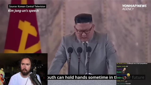 Kim Jong-un giving a speech with the North Korean flag in the background, symbolizing propaganda in authoritarian countries