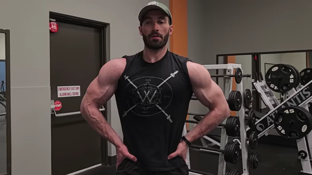 The speaker showcasing his improved physique in the gym.