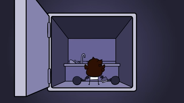 Jaiden is chained to a sink in an isolation chamber.