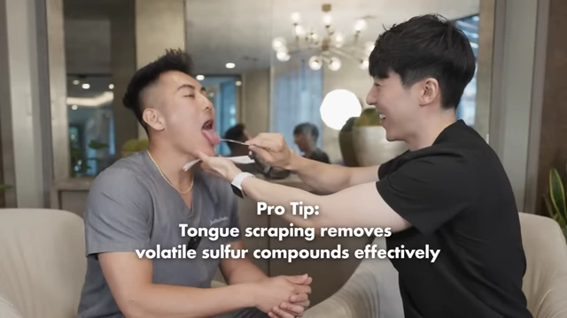 Demonstration of effective tongue scraping technique