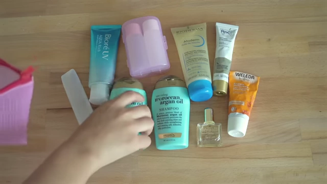A variety of travel-sized personal care products, illustrating common overpacking