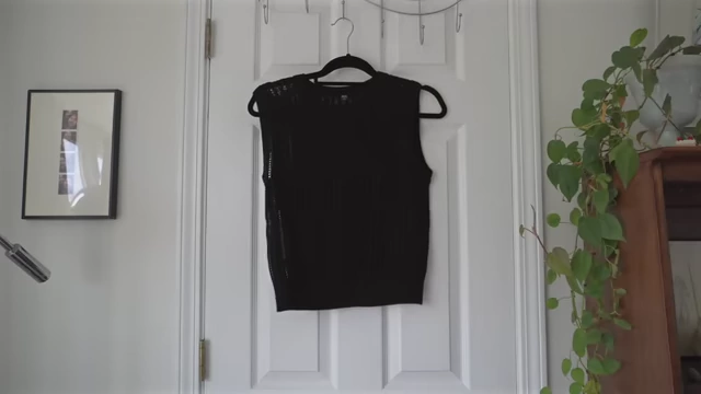 Uniqlo black tank top purchased in Japan for its high neckline and coverage