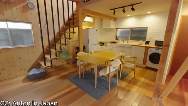 Renovated interior of Anton's Akiya, showing a bright, modern kitchen and living space