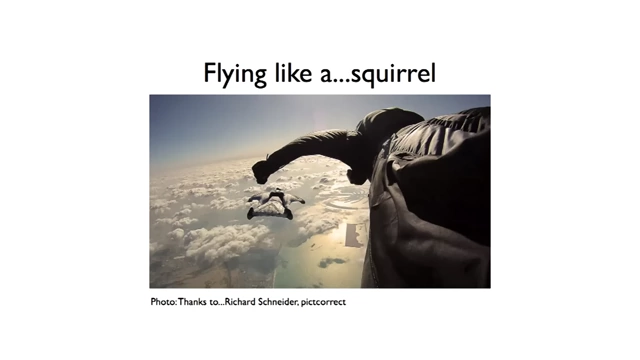 A person flying with a wingsuit, demonstrating a different way of flying