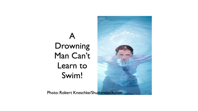 A man drowning in water, symbolizing the idea that 'a drowning man cannot learn to swim'