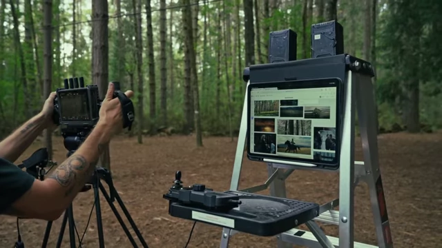 Remote control setup with tablet and joystick for operating the cable cam.