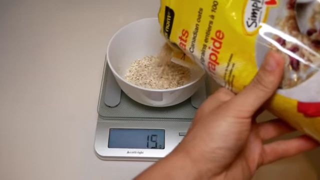 An individual weighing oats, demonstrating the calorie tracking Isabel found challenging due to her busy schedule