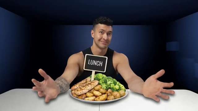 The speaker presenting a plate of the simple, repetitive CPB lunch, emphasizing the diet's strategy to reduce overeating