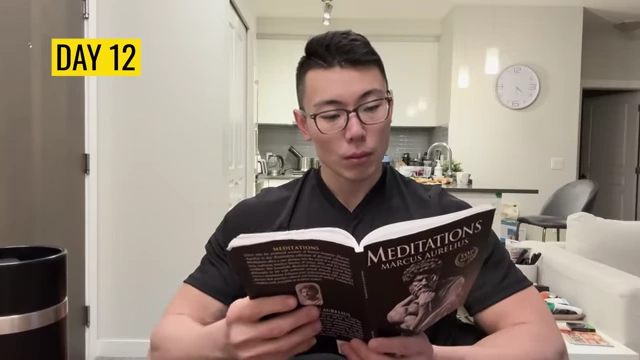 Max reading a book on Day 12, showcasing how he replaced food-centric activities with reading