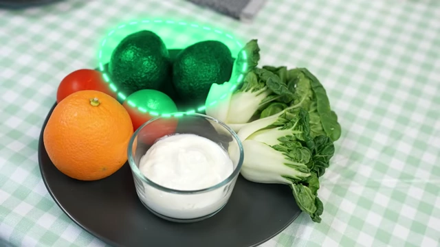 Isabel's additional food options: orange, tomato, avocado, Greek yogurt, and bok choy, chosen for micronutrients and variety