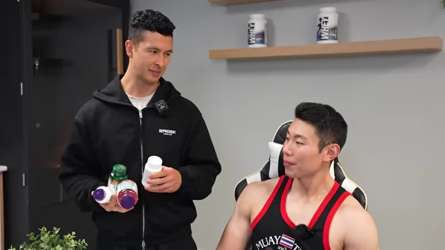 The speaker presenting Max with bottles of supplements, advising him to address potential micronutrient deficiencies from his strict diet