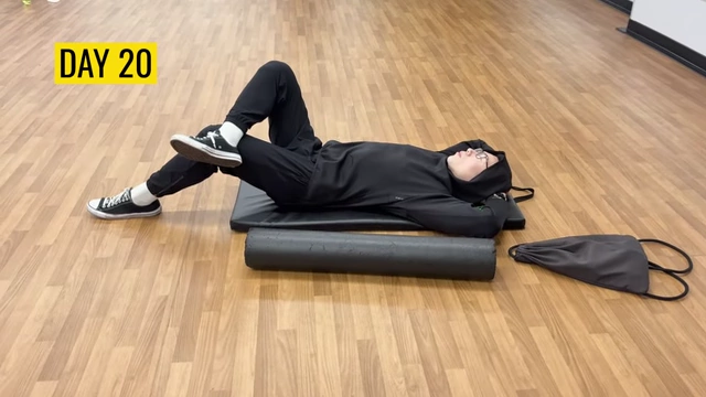 Max lying on a gym mat on Day 20, expressing mental fatigue from the strict diet