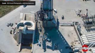 An aerial view of the Starship Pad 2 after scaffolding has been removed, highlighting the launch mount and surrounding infrastructure.