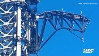 A close-up view of the Mechazilla arms during testing, showing their movement and structural integrity.