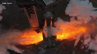 An overhead view of the Super Heavy Booster 20 static fire, showcasing the immense flames and the robust flame trench.