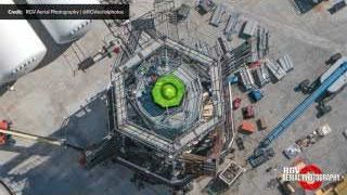 An overhead view of the Masseys test site, showing the booster header tank inside its reconfigured testing cage with new supports and cables.