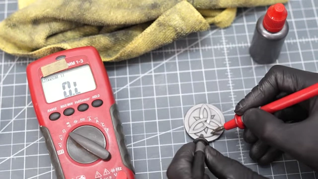 Checking conductivity of the coated print with a multimeter