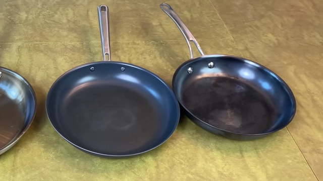 Misen and Anolon pans, representing the low-maintenance, nitrided carbon steel options.