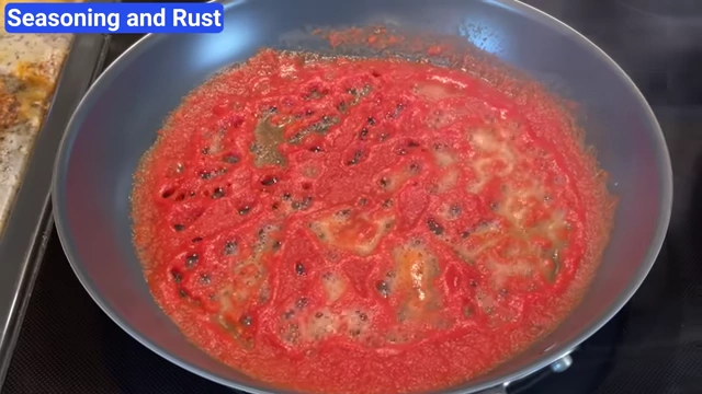 Strata pan showing seasoning being stripped away by simmering crushed tomatoes.